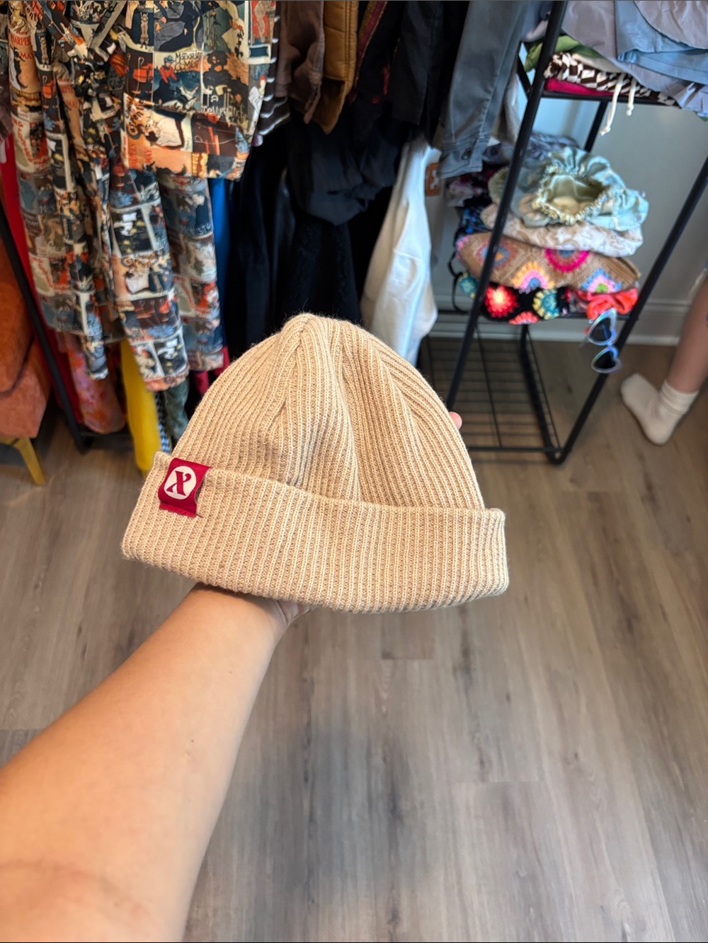 Beige Ribbed Knit Beanie with Red Logo Patch